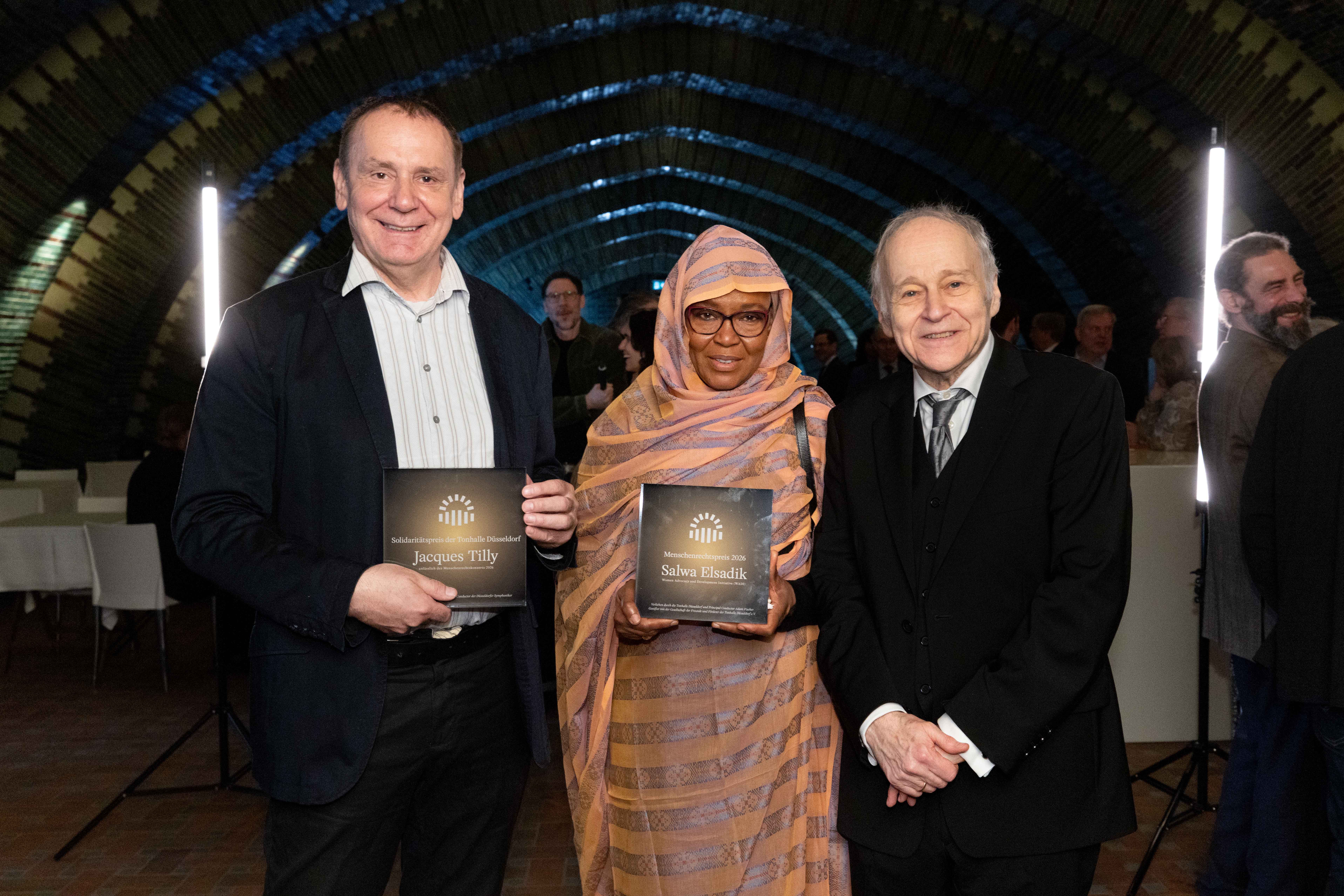 Jacques Tilly, Salwa Elsadik, Adam Fischer